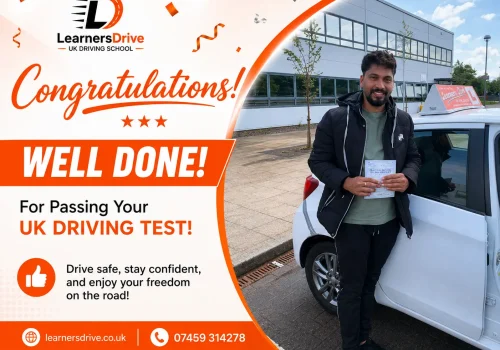 Successful LearnersDrive student proudly holding a UK Practical Driving Test Pass Certificate beside a LearnersDrive training car after passing the UK driving test.